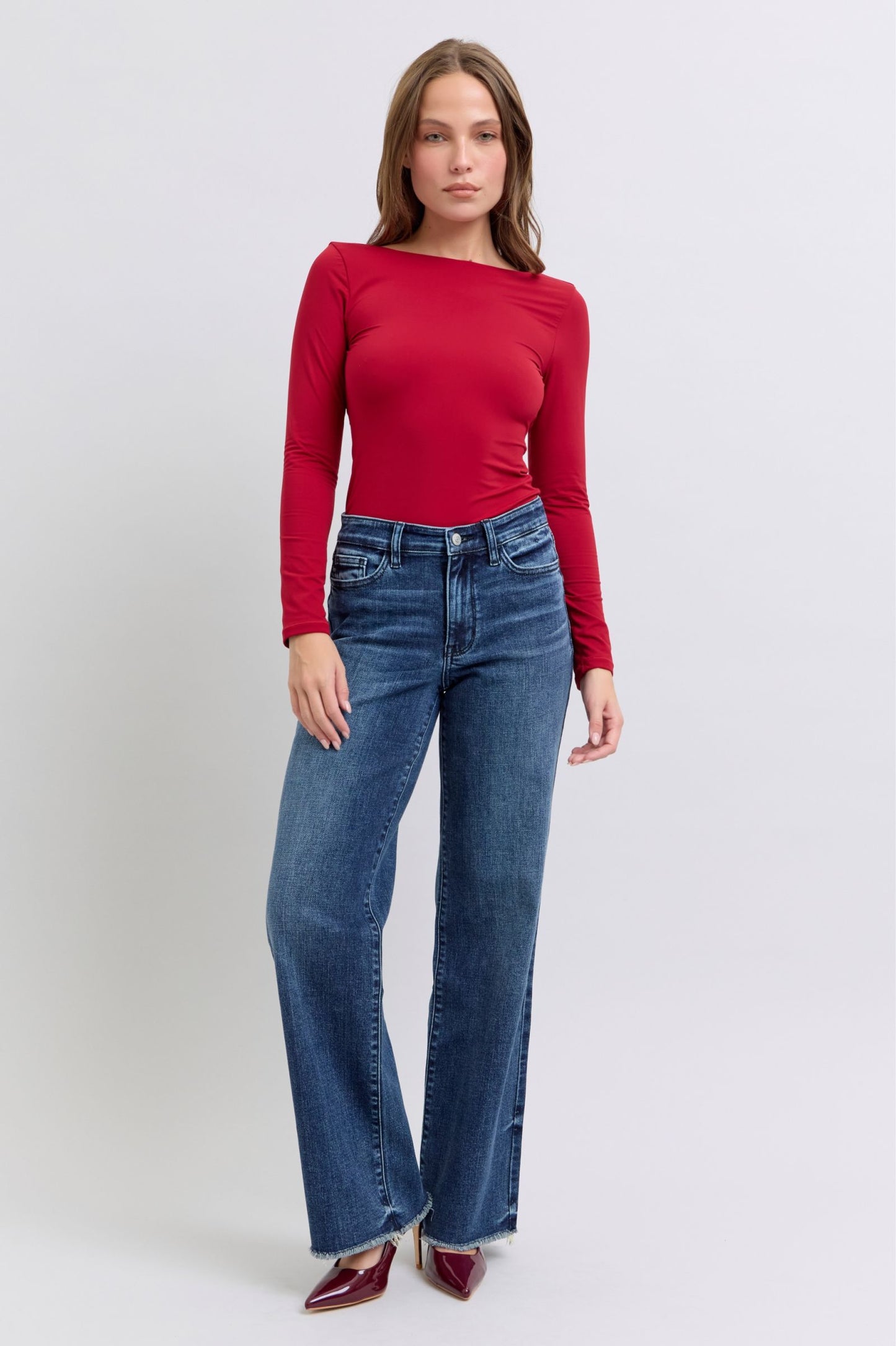 Judy Blue Full-Size Raw Hem Mid-Rise Jeans – Edgy and Comfortable Denim