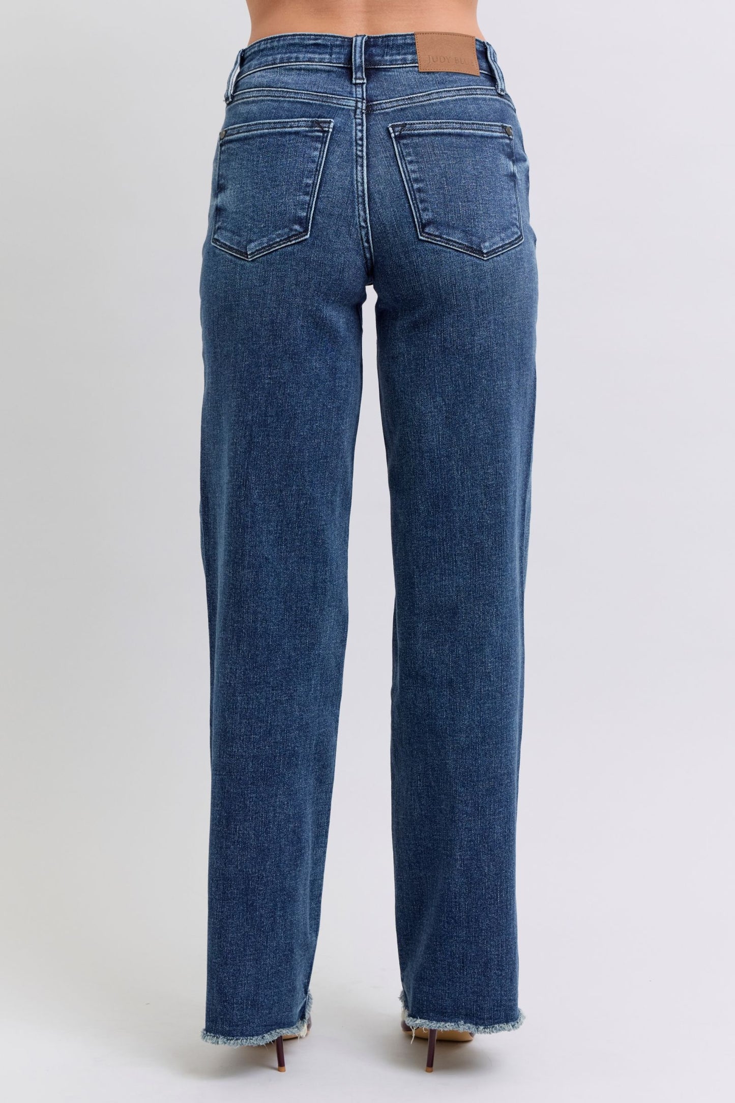 Judy Blue Full-Size Raw Hem Mid-Rise Jeans – Edgy and Comfortable Denim